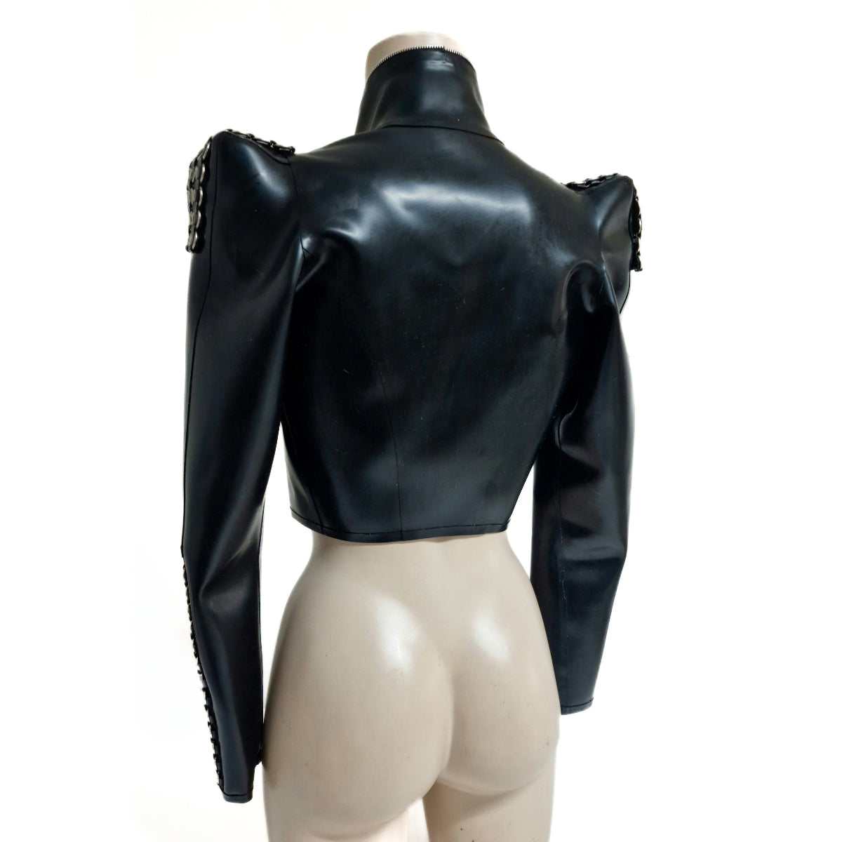 Latex jacket with structured shoulders and ring details..